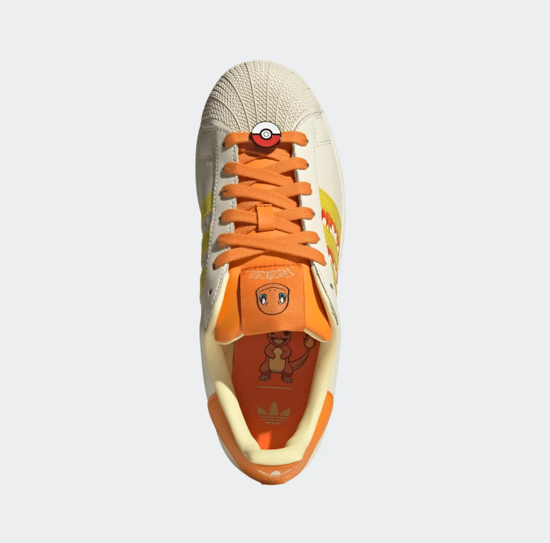 adidas Charmander Shell-Toe Sneakers in Cream and Orange