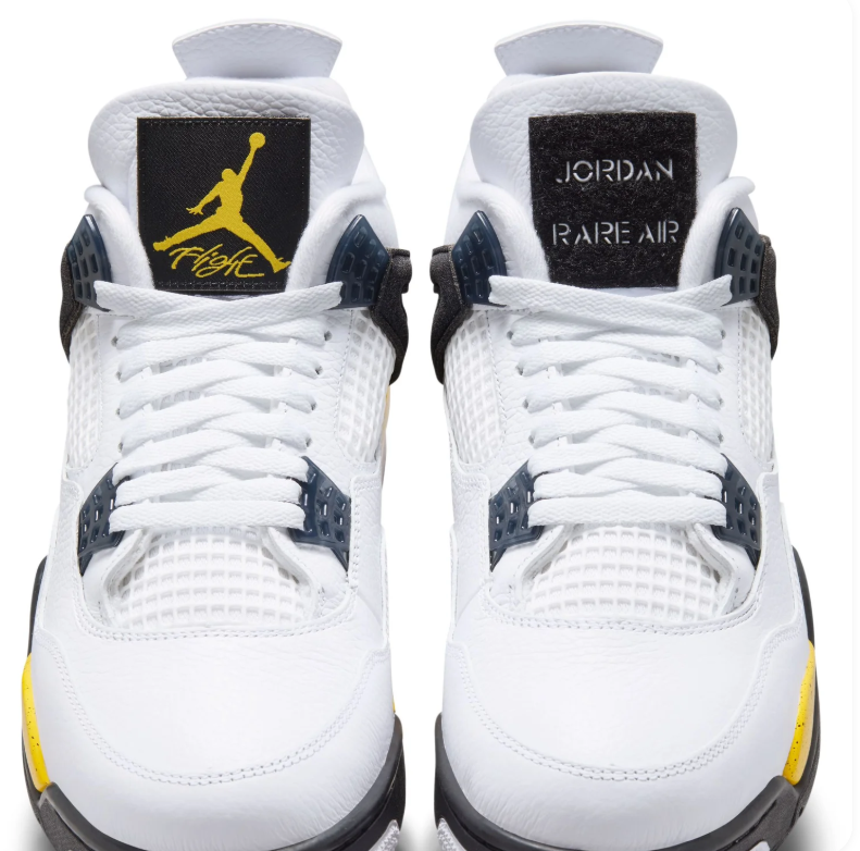 Air Jordan White Sneakers with Yellow Speckled Midsole and Black Side Wings