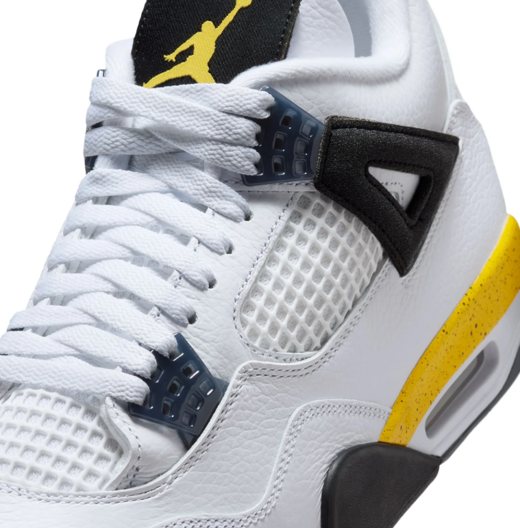 Air Jordan White Sneakers with Yellow Speckled Midsole and Black Side Wings