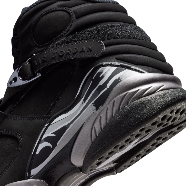 Air Jordan Black High-Top Sneakers with Cross Straps and Silver-Grey Accents