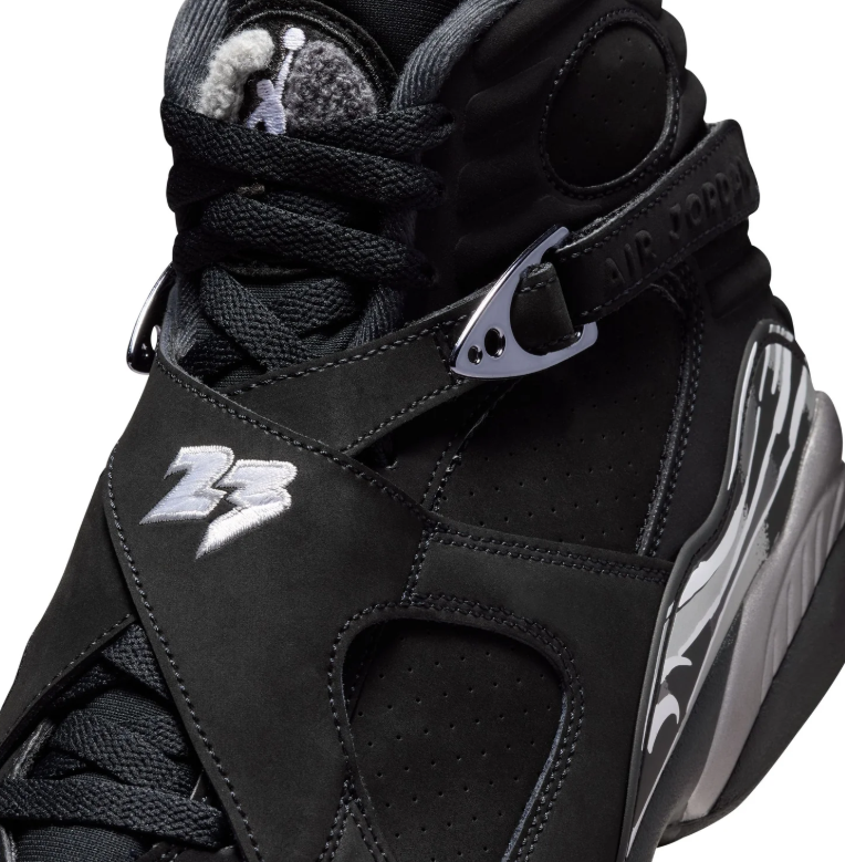 Air Jordan Black High-Top Sneakers with Cross Straps and Silver-Grey Accents