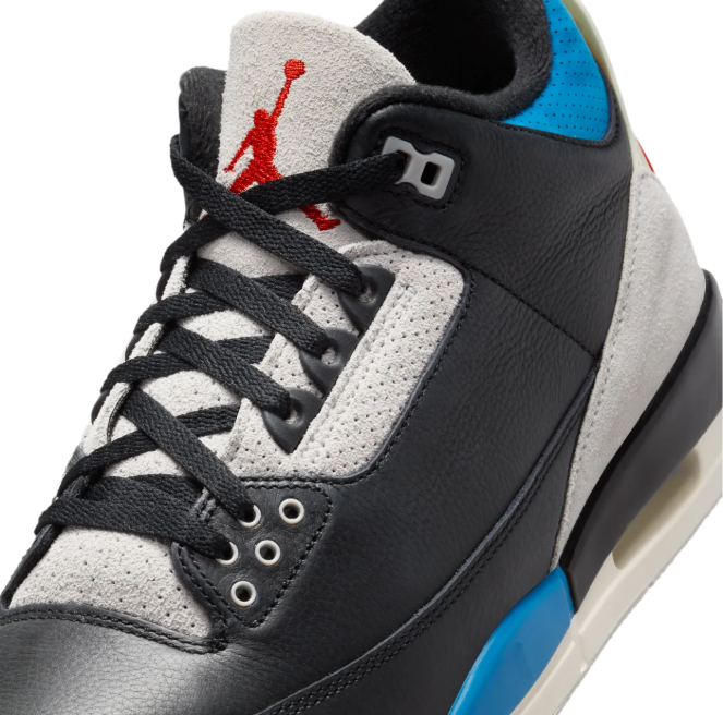 Air Jordan Black Sneakers with Blue Accents and Red Jumpman Logo