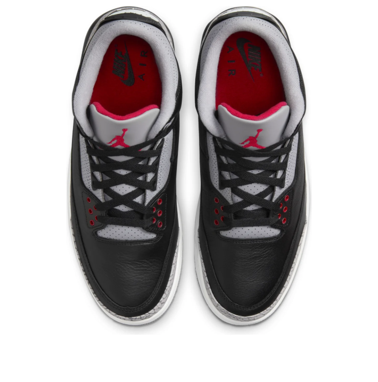 Air Jordan Black Sneakers with Grey Elephant-Print Overlays and Red Accents