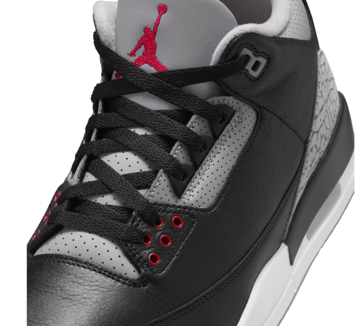 Air Jordan Black Sneakers with Grey Elephant-Print Overlays and Red Accents