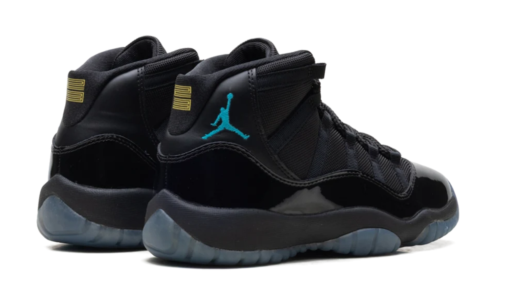 Air Jordan Black High-Top Sneakers with Glossy Trim and Teal Jumpman Logo