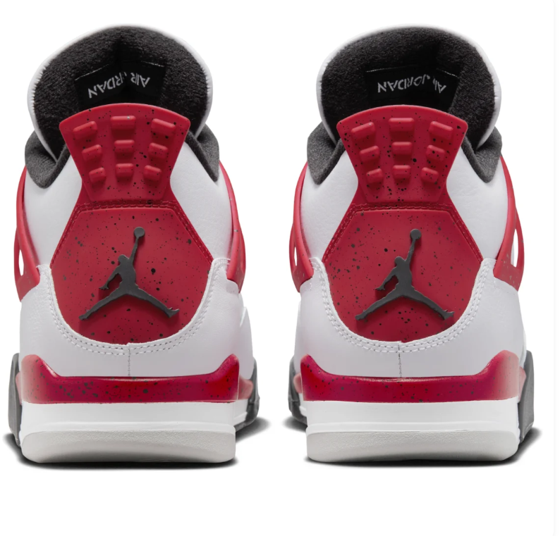 Air Jordan White Sneakers with Red Speckled Side Wings and Black Accents