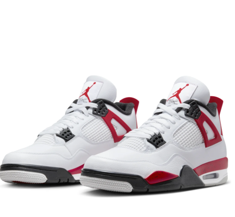 Air Jordan White Sneakers with Red Speckled Side Wings and Black Accents