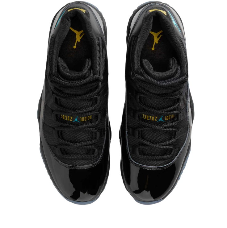 Air Jordan Black High-Top Sneakers with Glossy Trim and Teal Accents