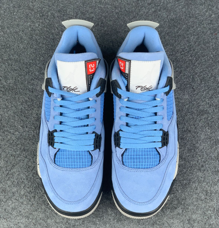 Air Jordan 4 Retro Light Blue Sneakers with Grey Speckled Trim