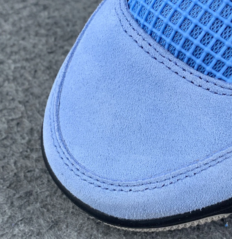 Air Jordan 4 Retro Light Blue Sneakers with Grey Speckled Trim