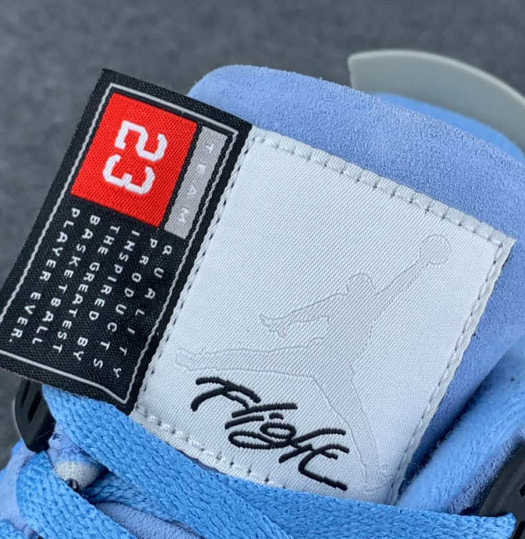 Air Jordan 4 Retro Light Blue Sneakers with Grey Speckled Trim