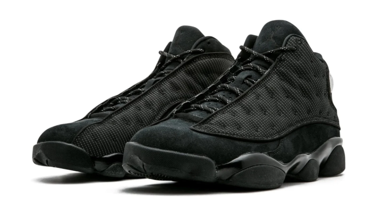 Air Jordan All-Black Sneakers with Textured Side Panels and Green Heel Badge