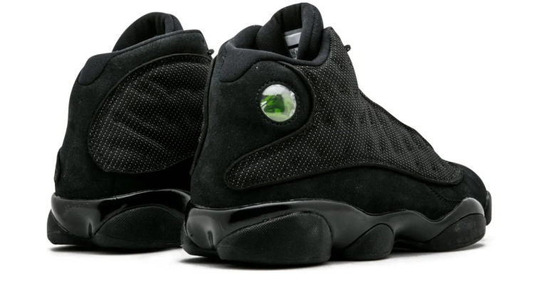Air Jordan All-Black Sneakers with Textured Side Panels and Green Heel Badge