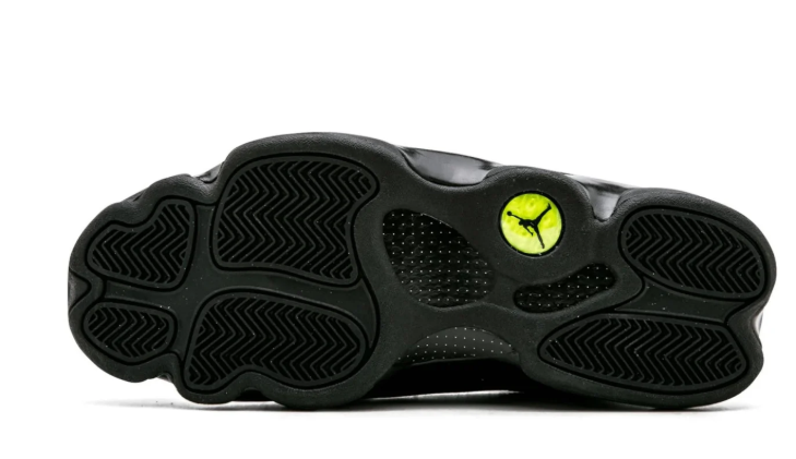 Air Jordan All-Black Sneakers with Textured Side Panels and Green Heel Badge