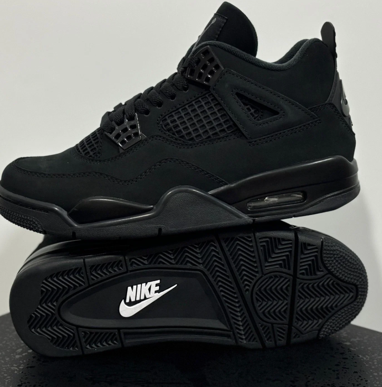 Air Jordan All-Black Sneakers with Grid Panels and Glossy Lace Tabs