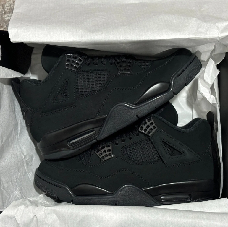 Air Jordan All-Black Sneakers with Grid Panels and Glossy Lace Tabs