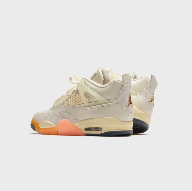 Air Jordan Cream and Light Grey Sneakers with Orange and Coral Sole Accents