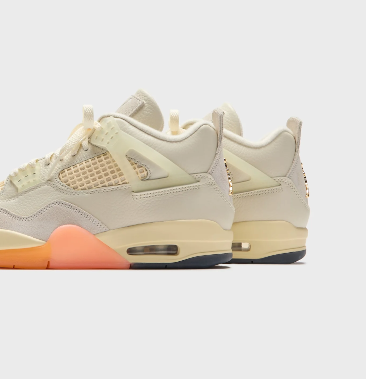 Air Jordan Cream and Light Grey Sneakers with Orange and Coral Sole Accents