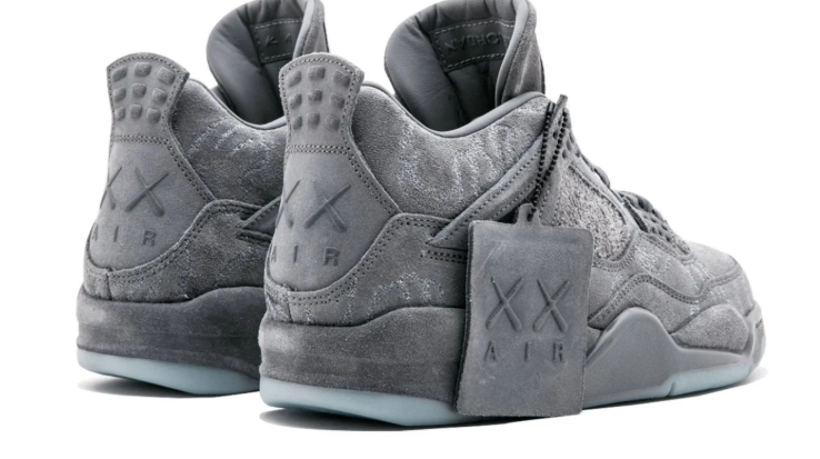 Air Jordan Grey Sneakers with Tonal Graphic Panels and Pale Blue Outsole