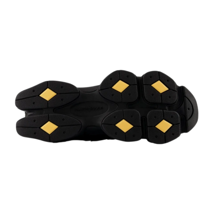 New Balance Black Mesh Sneakers with Lime Accents and Segmented Chunky Sole