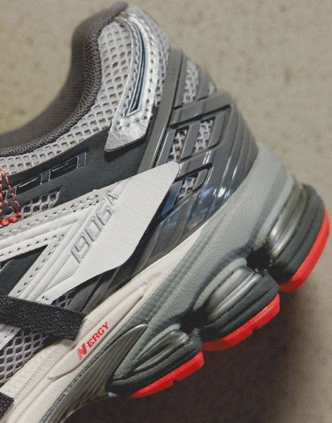 New Balance 1906R Grey Mesh Sneakers with White Overlays and Coral Outsole