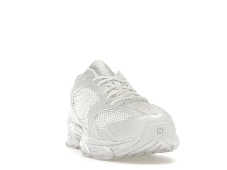 New Balance Grey Mesh Sneakers with Outlined N Logo and Blue Heel Accents